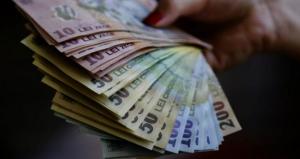 Peste 80% dintre romani vor economisi bani pentru perioada urmatoare